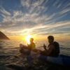 sunrise kayaking at the pacific ocean