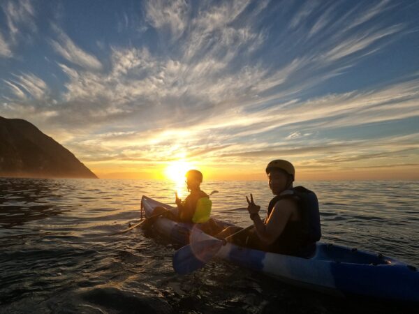 sunrise kayaking at the pacific ocean